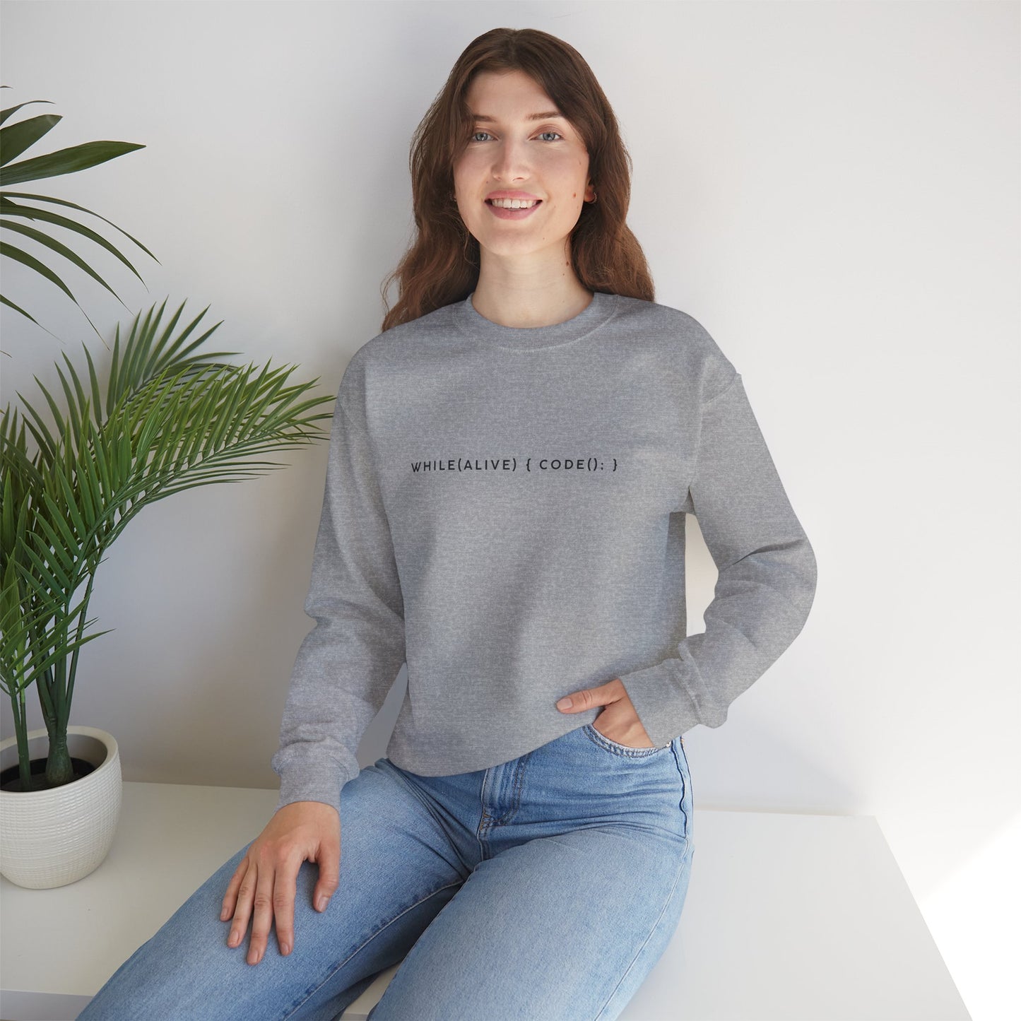 “while(alive)” Coding Sweatshirt – Unisex Heavy Blend Crewneck