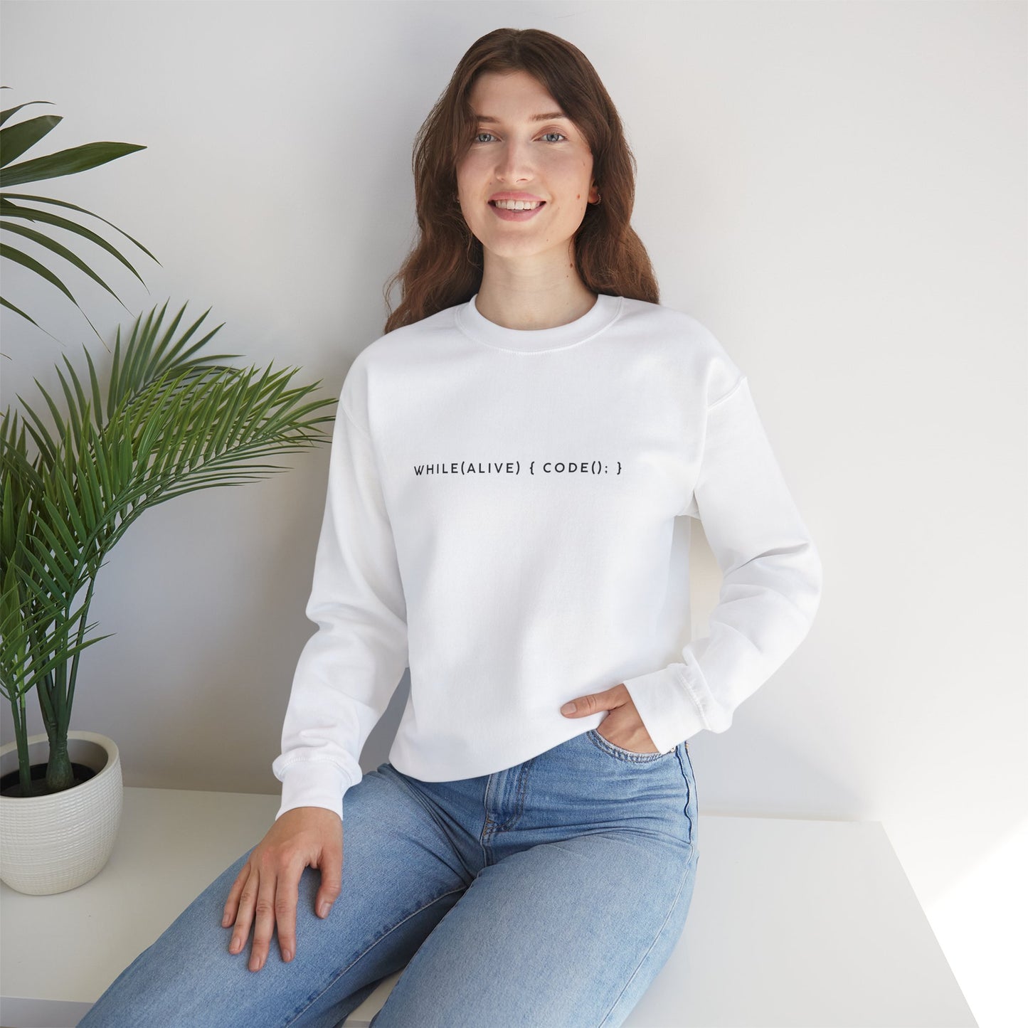 “while(alive)” Coding Sweatshirt – Unisex Heavy Blend Crewneck