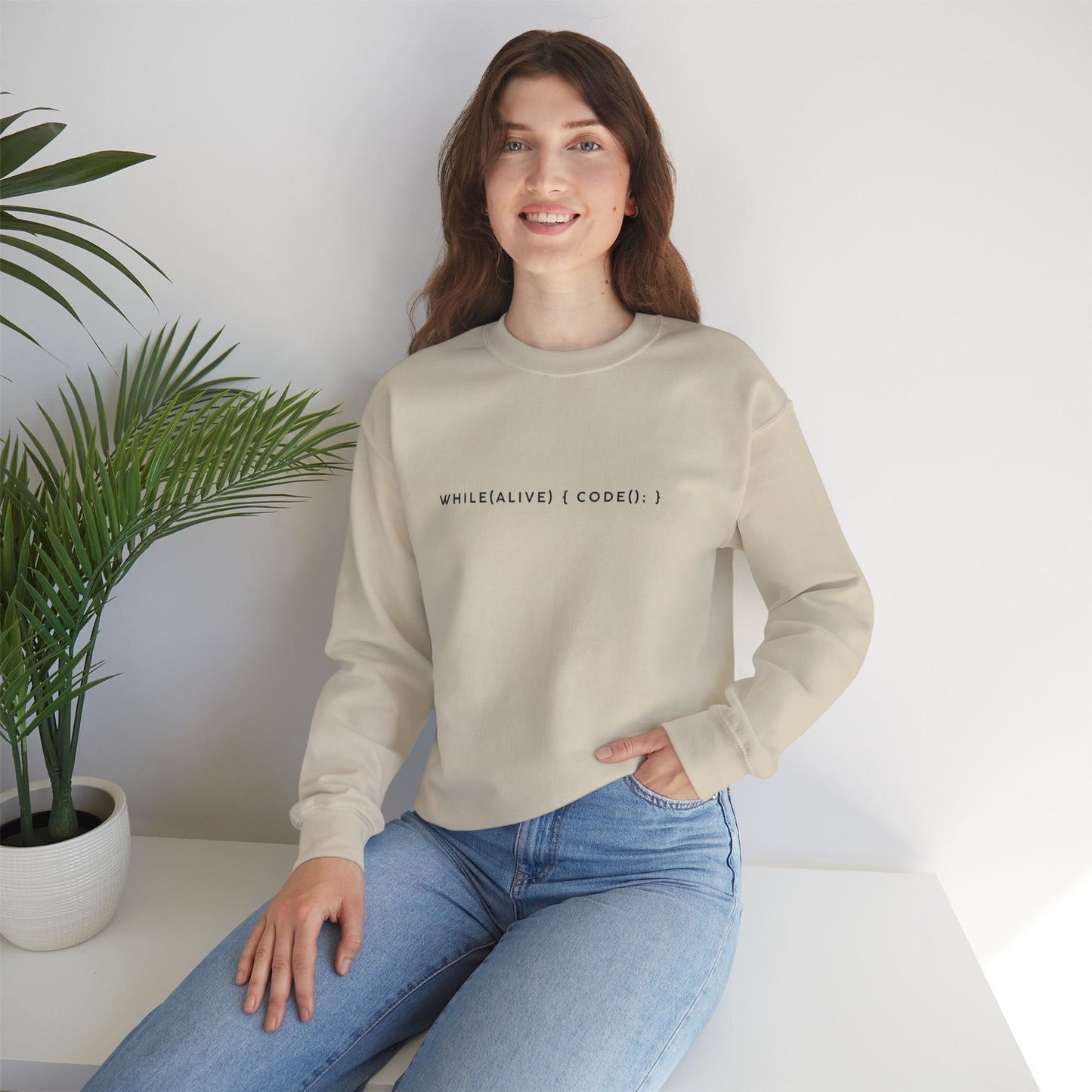 “while(alive)” Coding Sweatshirt – Unisex Heavy Blend Crewneck